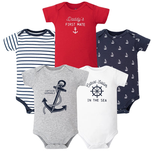 Set of five nautical-themed baby bodysuits on a white background