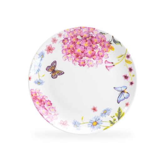 Decorative plate with floral and butterfly design on a white background
