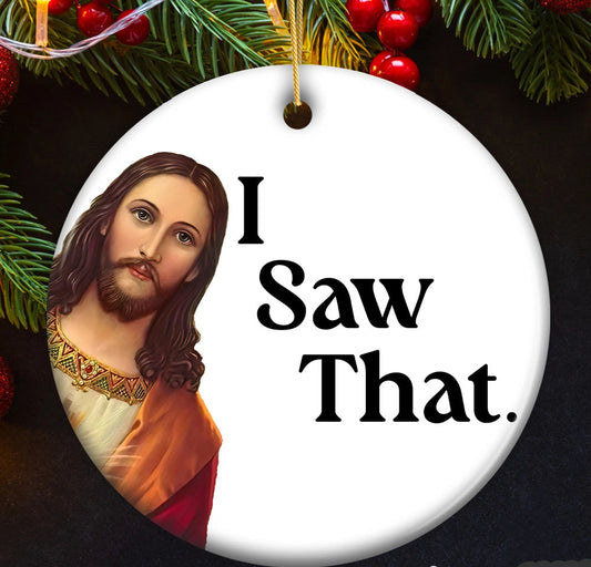 Ornament with a religious figure and 'I Saw That' text, surrounded by Christmas decorations.
