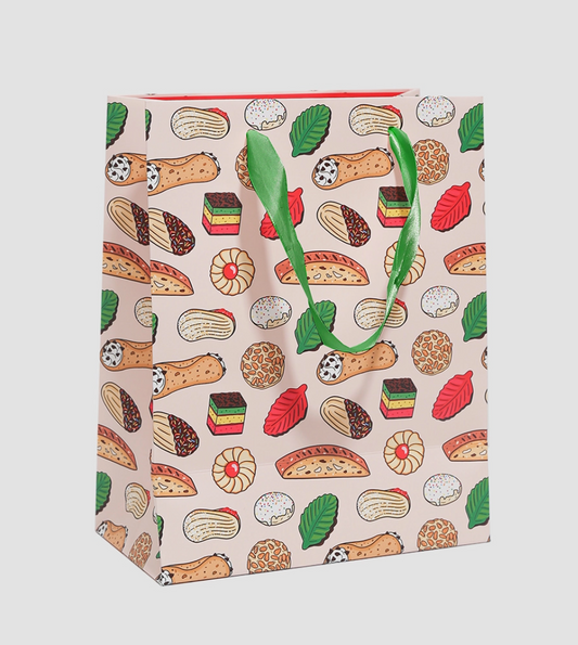 Gift bag with dessert pattern and green handle on a light gray background