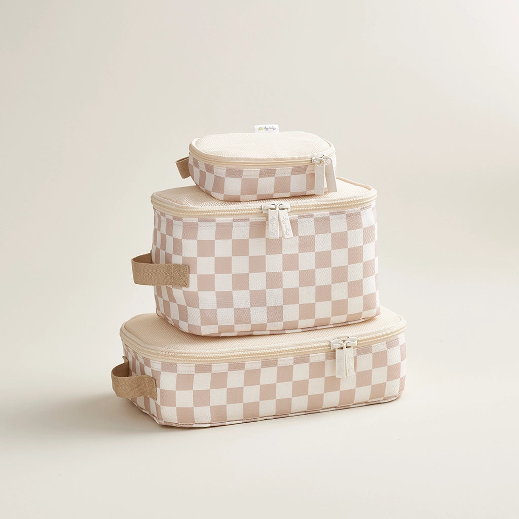 Set of three checkered storage boxes stacked on a light background