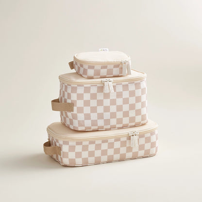 Set of three checkered storage boxes stacked on a light background