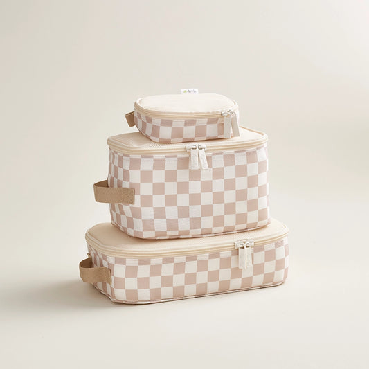 Set of three checkered storage boxes stacked on a light background