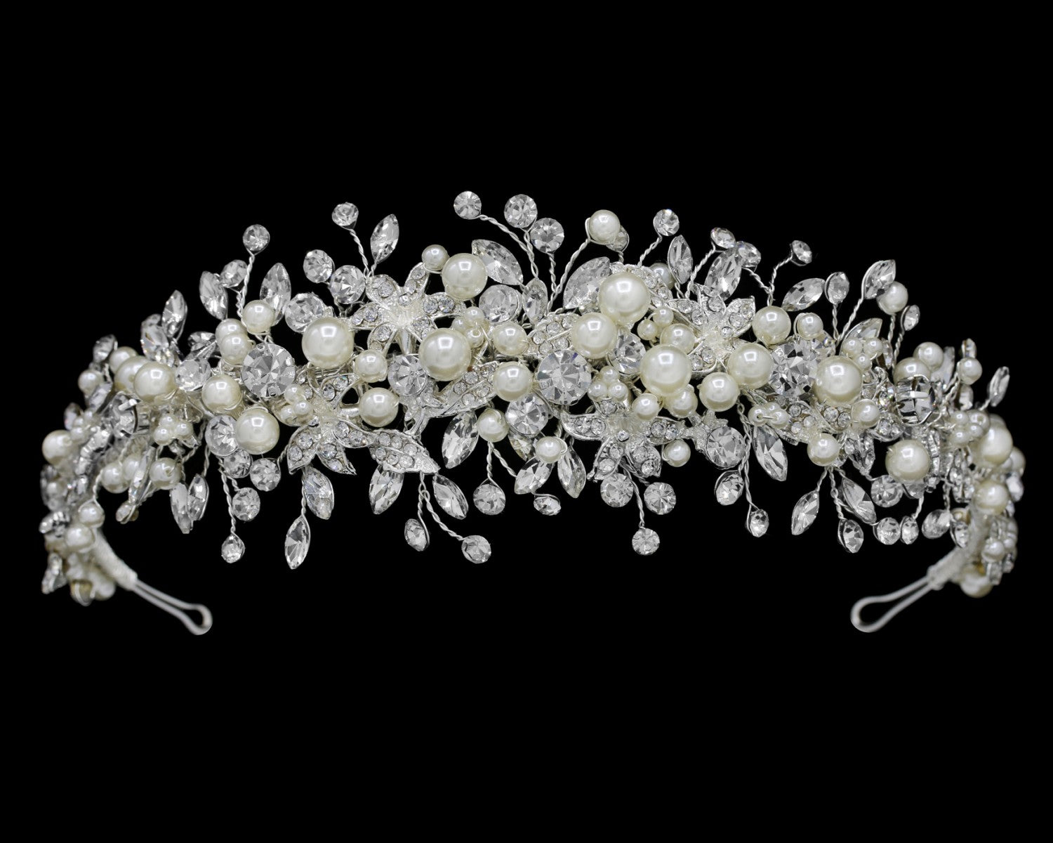 Pearl and crystal tiara on a black background
