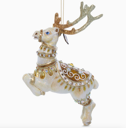 Jay Strongwater Blitzen glass reindeer ornament in ivory and gold with jeweled saddle, glittered antlers and European crystals