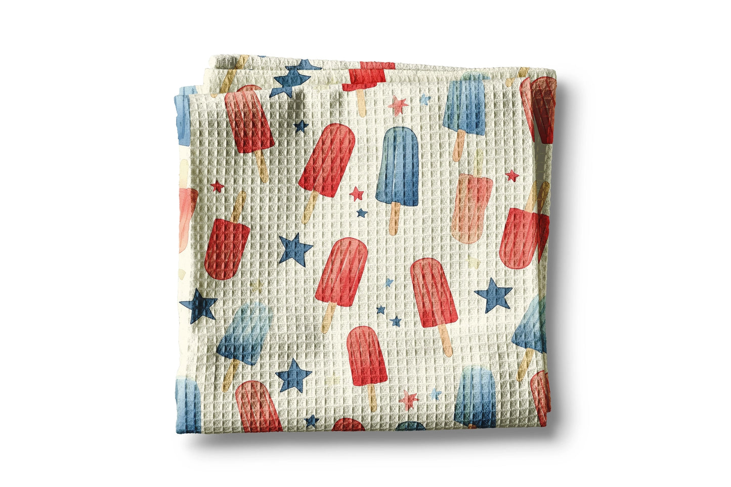 Waffle-textured blanket with popsicle pattern on a white background