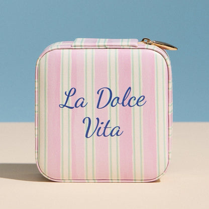 Striped case with 'La Dolce Vita' text on a blue and beige background