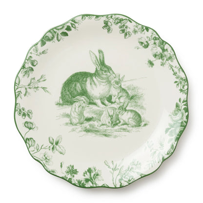 Decorative plate with green rabbit illustration on a white background