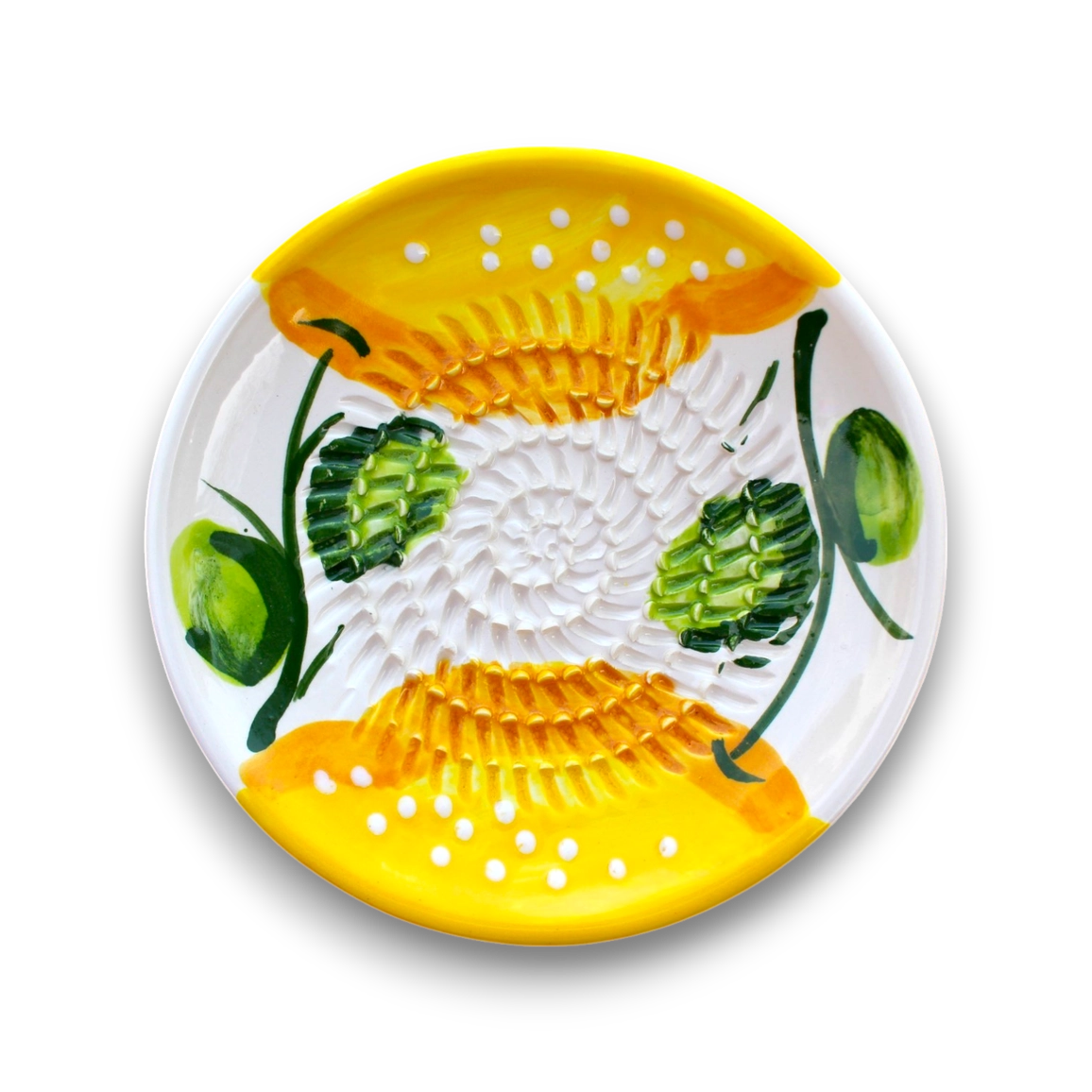 A round white ceramic plate with a hand-painted yellow and green floral pattern, featuring textured yellow sections with white dots and green leaf motifs, shown on a white background.