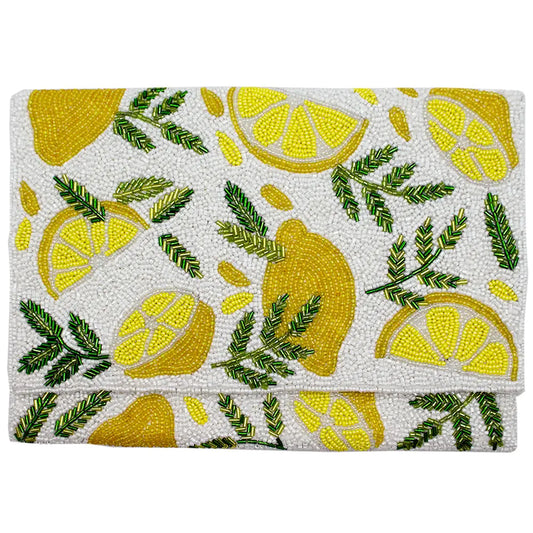 Clutch bag with lemon pattern on a white background