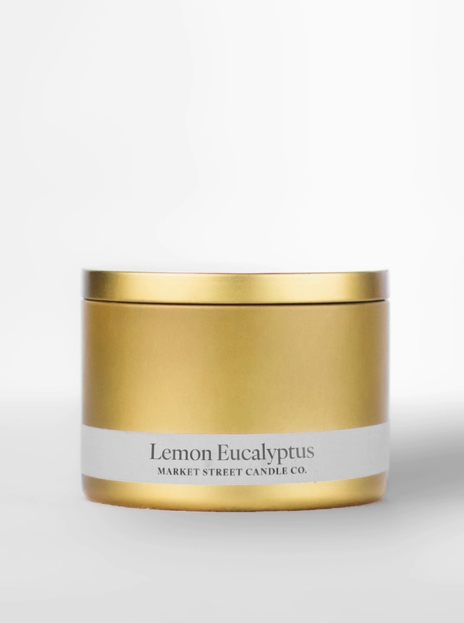 Lemon Eucalyptus 8 oz Travel Tin soy candle in a sleek gold metal tin with white Market Street Candle Co. label.