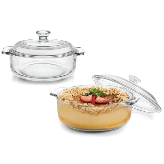 Glass baking dish with lid containing dessert on a white background