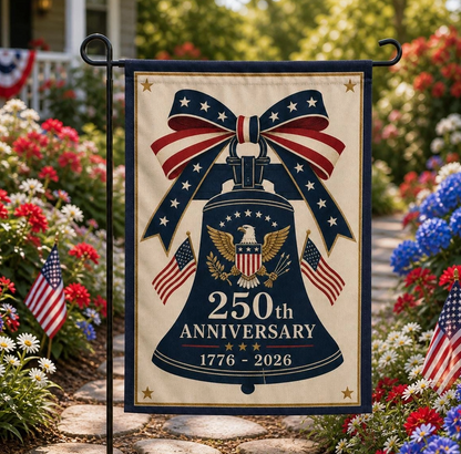 Decorative garden flag celebrating the 250th anniversary of a bell with American flags and flowers in the background.