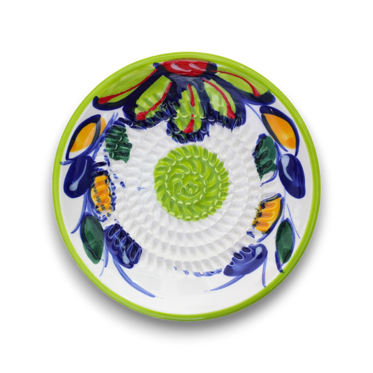 Decorative ceramic plate with colorful floral patterns on a white background
