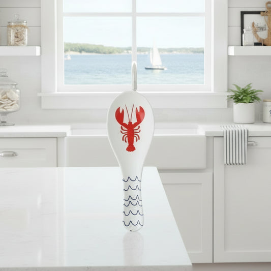 Spoon rest with red lobster design on a white background