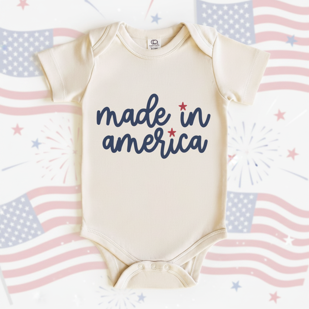 Baby onesie with 'made in america' text on a white background