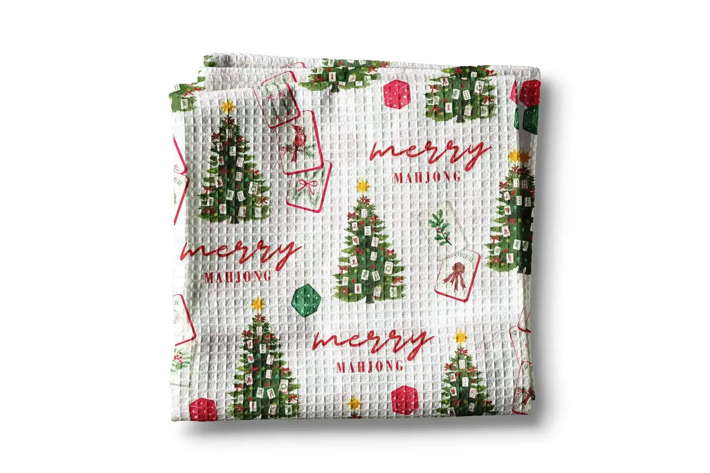 Waffle-textured towel with Christmas tree and 'merry mahjong' pattern on a white background