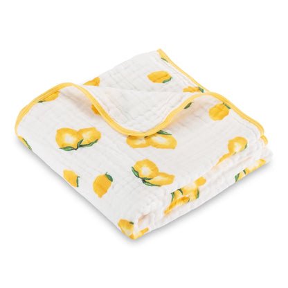 Baby blanket with lemon pattern on a white background