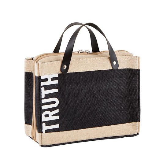 Canvas tote bag with black and beige design and 'TRUTH' text on a white background
