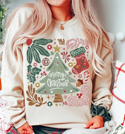 Person wearing a Christmas-themed sweatshirt with festive designs.