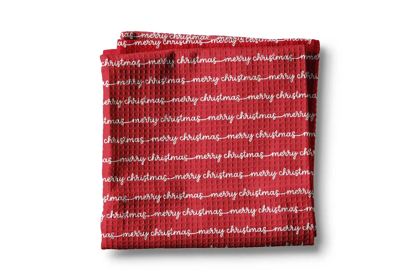 Red towel with 'merry christmas' text on a white background
