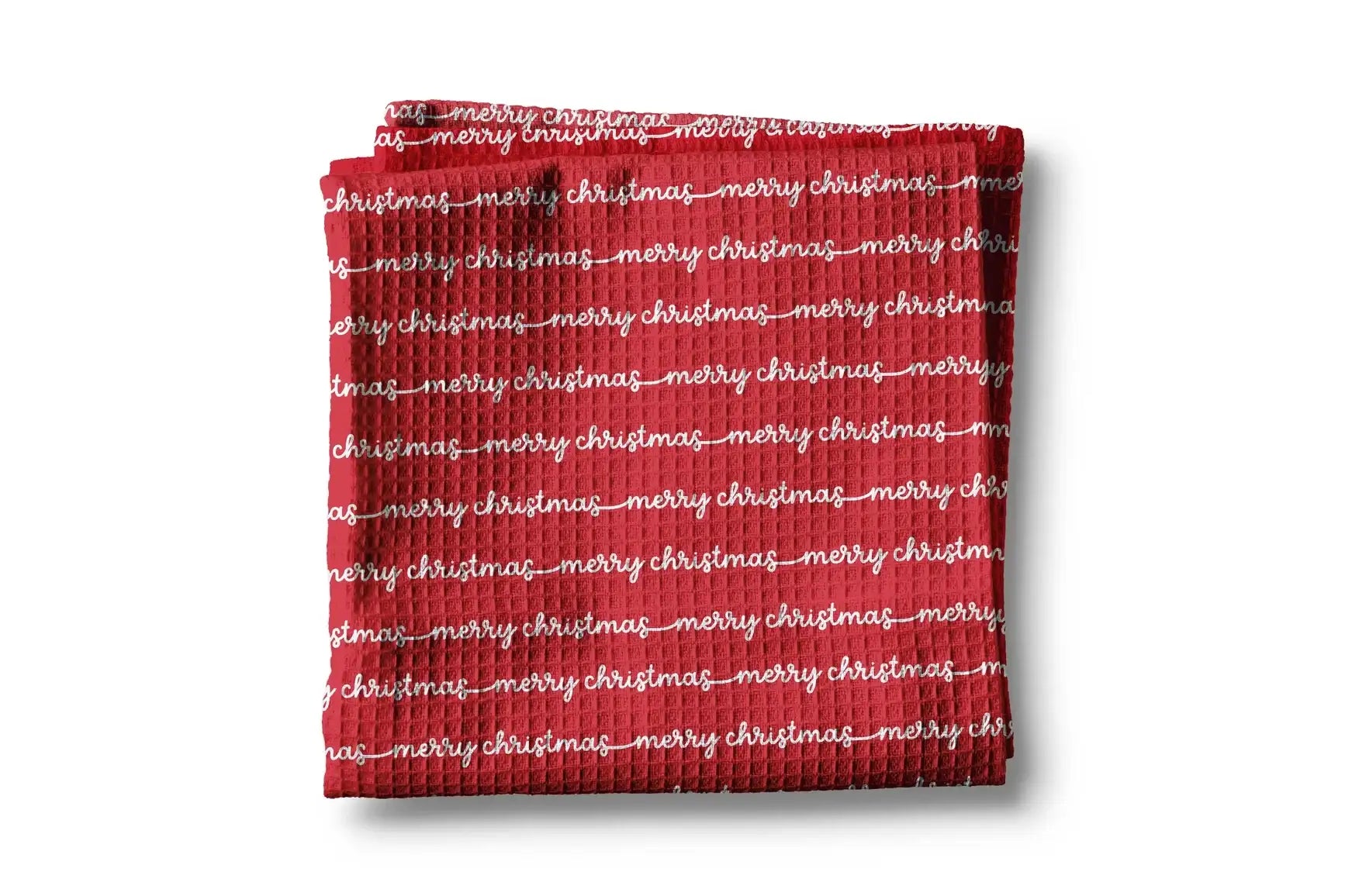 Red towel with 'merry christmas' text on a white background