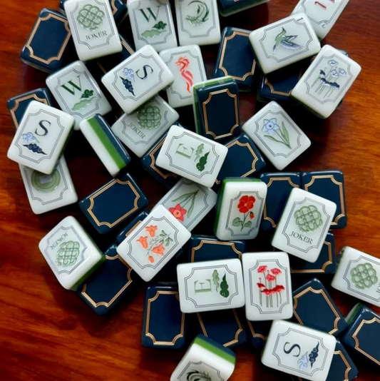 Midnight Blue Botanical American Mahjong tiles with ivory floral faces, navy blue backs and elegant gold decorative borders