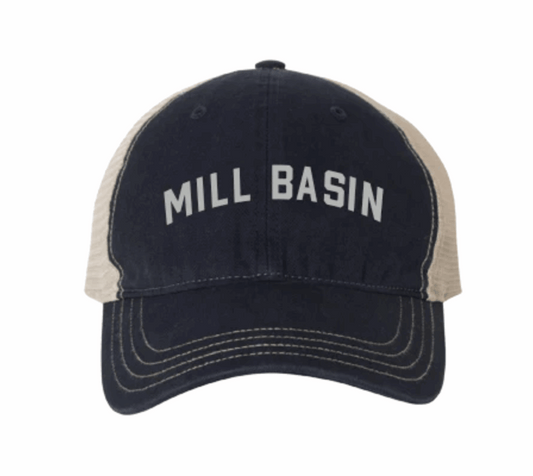 Navy blue cap with 'MILL BASIN' text on a white background