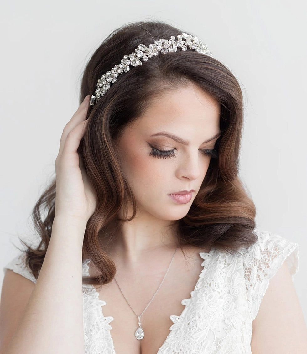 Bride wearing silver mosaic crystal wedding headband with loose waves