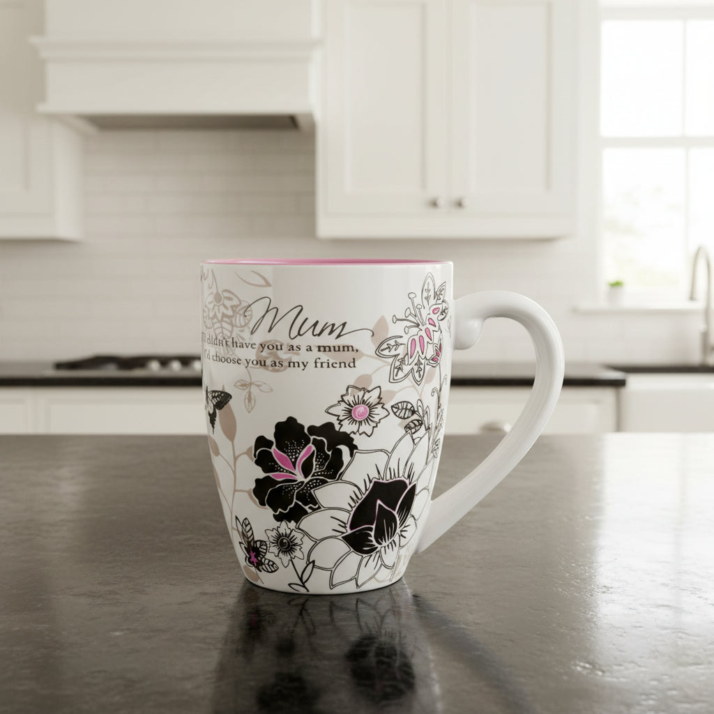 Mug with floral design and text on a white background