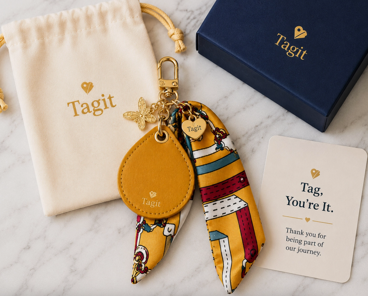 Mustard yellow bee AirTag holder bag charm with patterned scarf, gold-plated charms, gift pouch and box