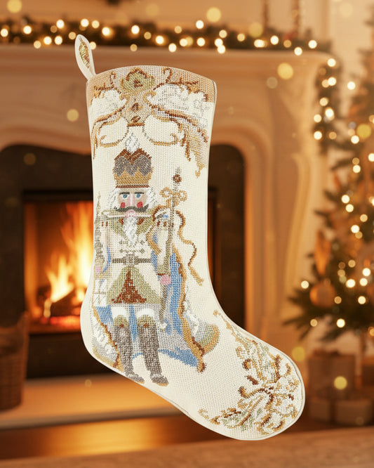 Nutcracker Ivory Needlepoint Christmas Stocking featuring a wool needlepoint nutcracker design in ivory, blue, sage and gold