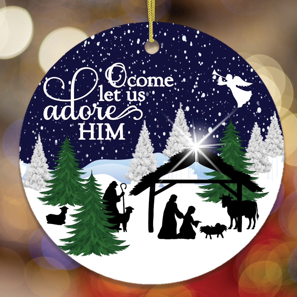 Decorative Christmas ornament with nativity scene and 'O come let us adore Him' text.