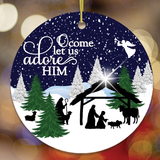 Decorative Christmas ornament with nativity scene and 'O come let us adore Him' text.