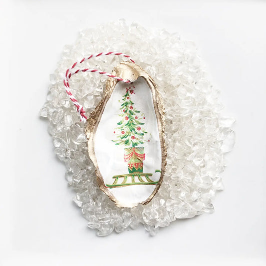 Decorative shell with Christmas tree design on a white background