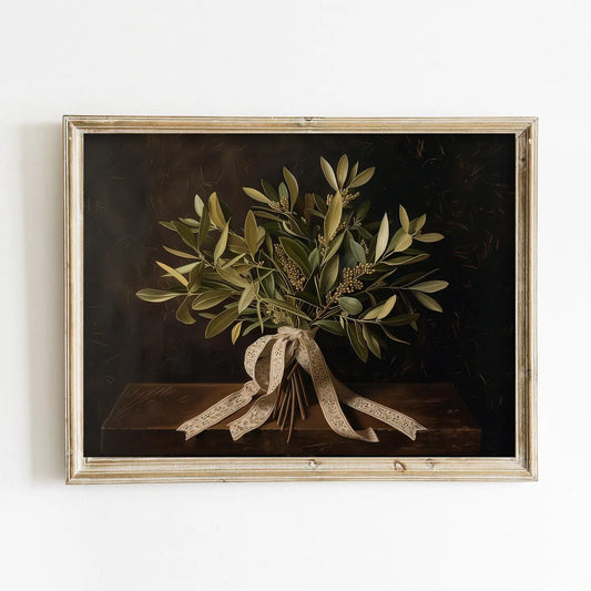 Framed artwork of a bouquet of leaves with a ribbon on a dark background