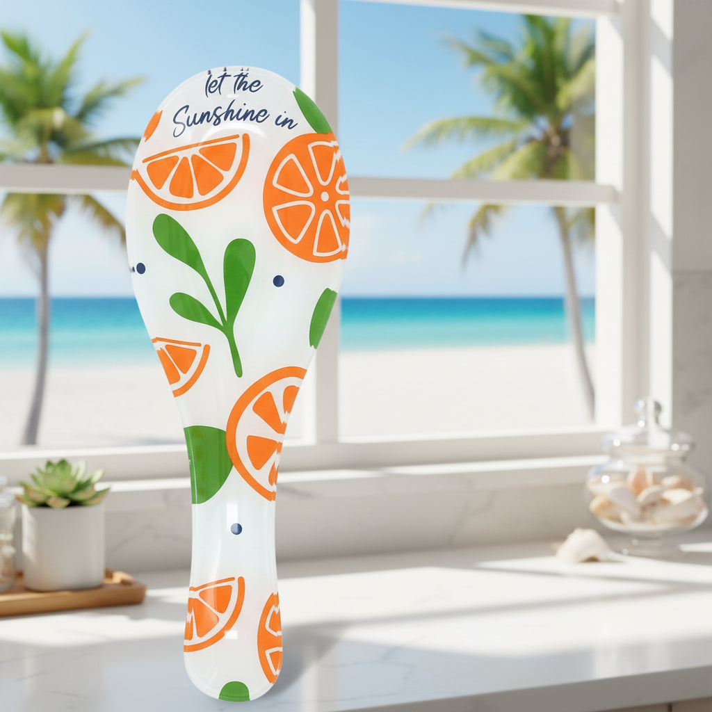 Spoon Rest with orange and green design on a white background