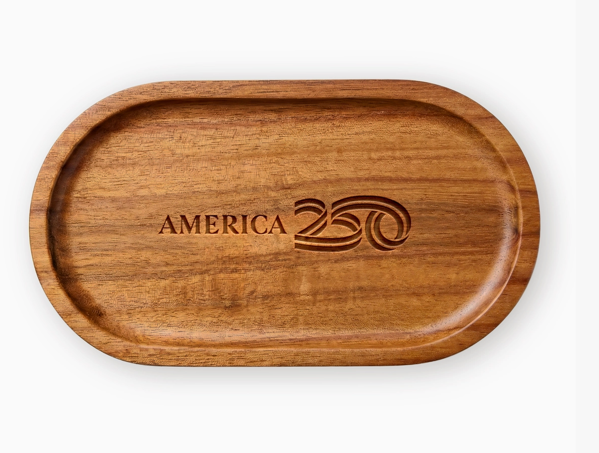 Wooden tray with 'America 250' engraving on a white background