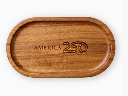 Wooden tray with 'America 250' engraving on a white background