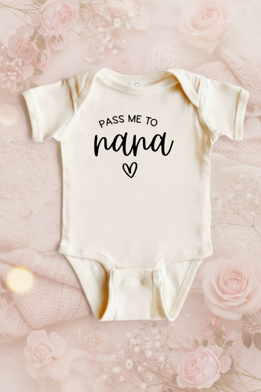 Baby onesie with 'Pass me to nana' text on a white background