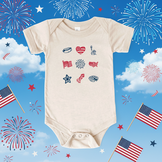 Beige baby onesie with colorful graphic designs on a white background