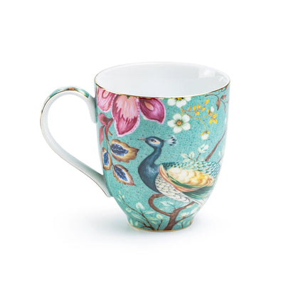 Decorative mug with peacock and floral design on a white background