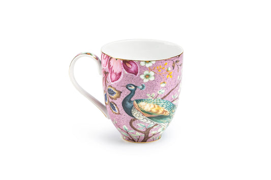 Colorful mug with peacock design on a white background
