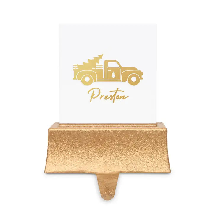 Gold name card holder with a truck design and 'Preston' text on a white background