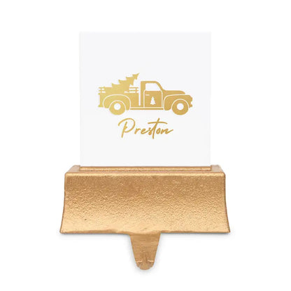 Gold name card holder with a truck design and 'Preston' text on a white background