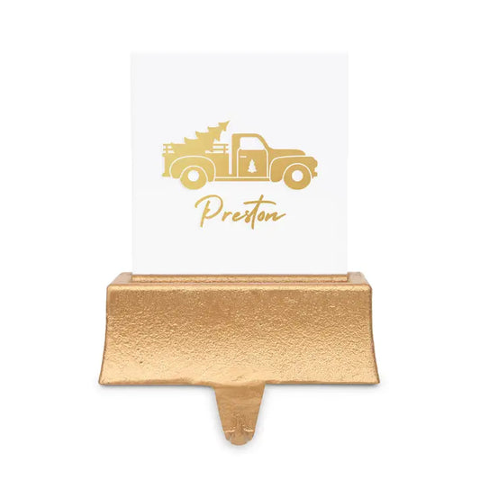 Gold name card holder with a truck design and 'Preston' text on a white background