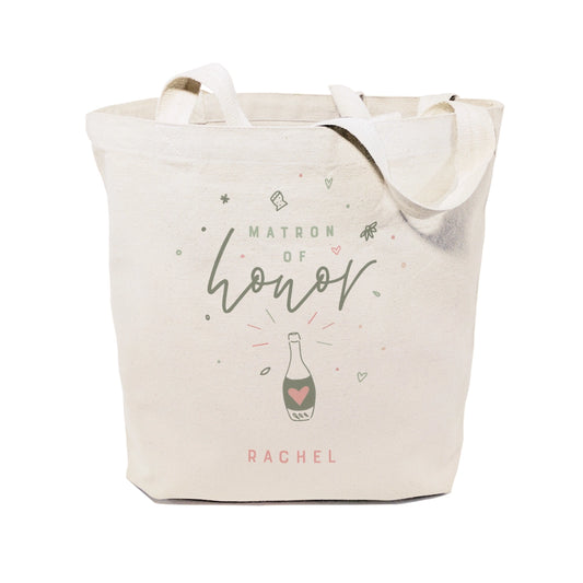 Beige tote bag with 'Matron of Honor Rachel' text and champagne bottle graphic on a white background