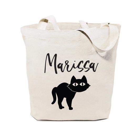 Canvas tote bag with a black cat illustration and 'Marissa' text on a white background