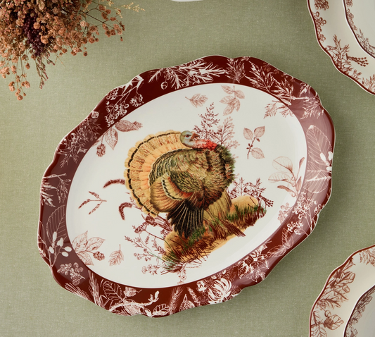 Decorative plate with a turkey design on a green background