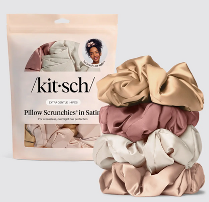 Kit'sch pillow scrunchies in satin packaging with scrunchies displayed in front.